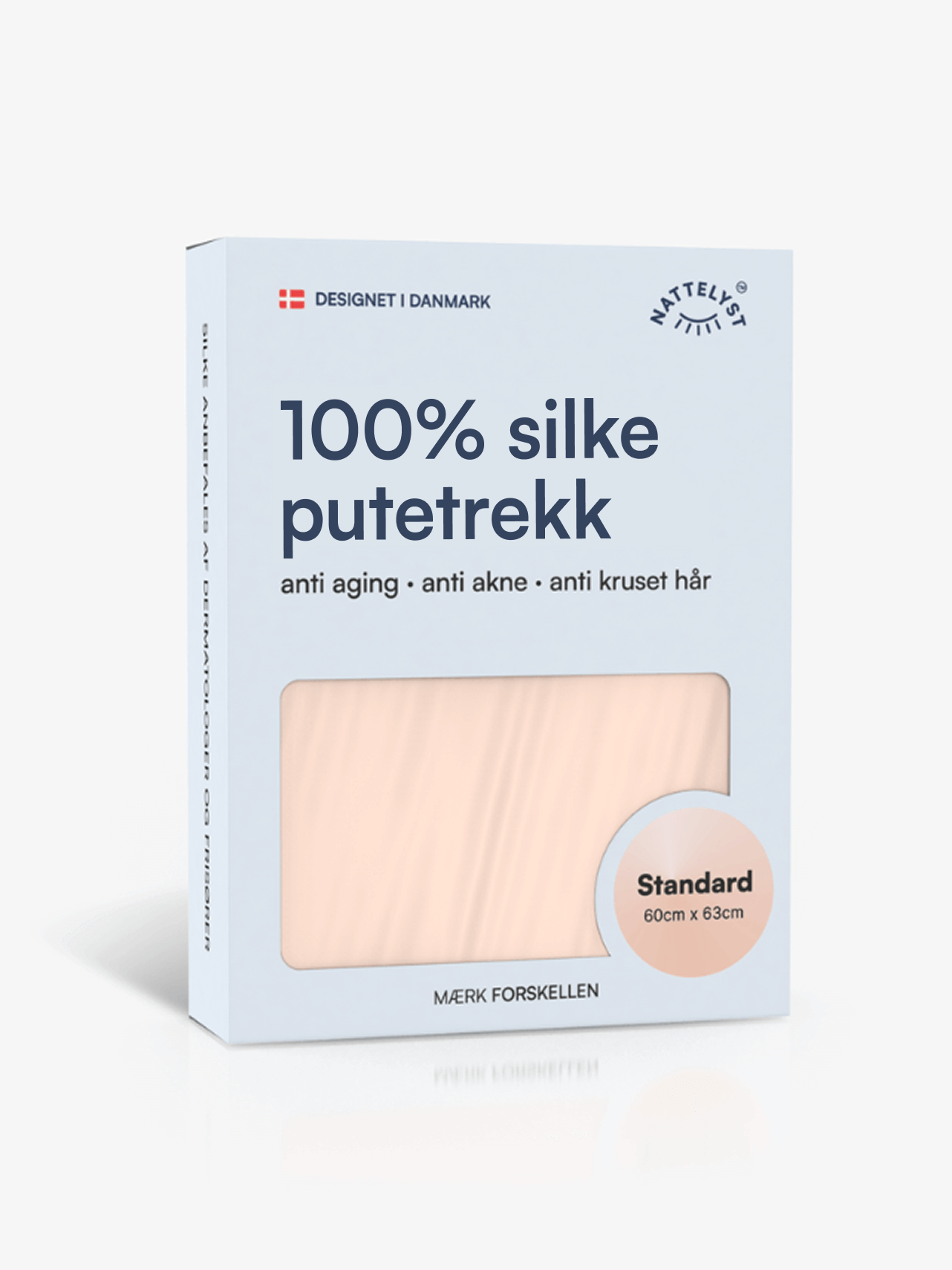 Beige putetrekk i 100 prosent morbærsilke på oppredd seng