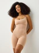Zonal support shaping body med korte bein fra Lindex